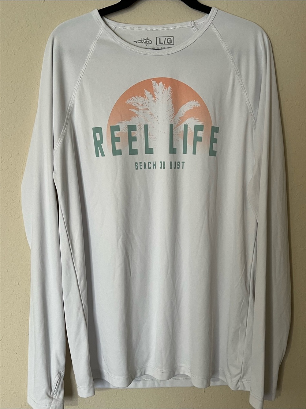 Women’s Long-Sleeve UV Reel Life Shirt - White with Coral & Teal Print